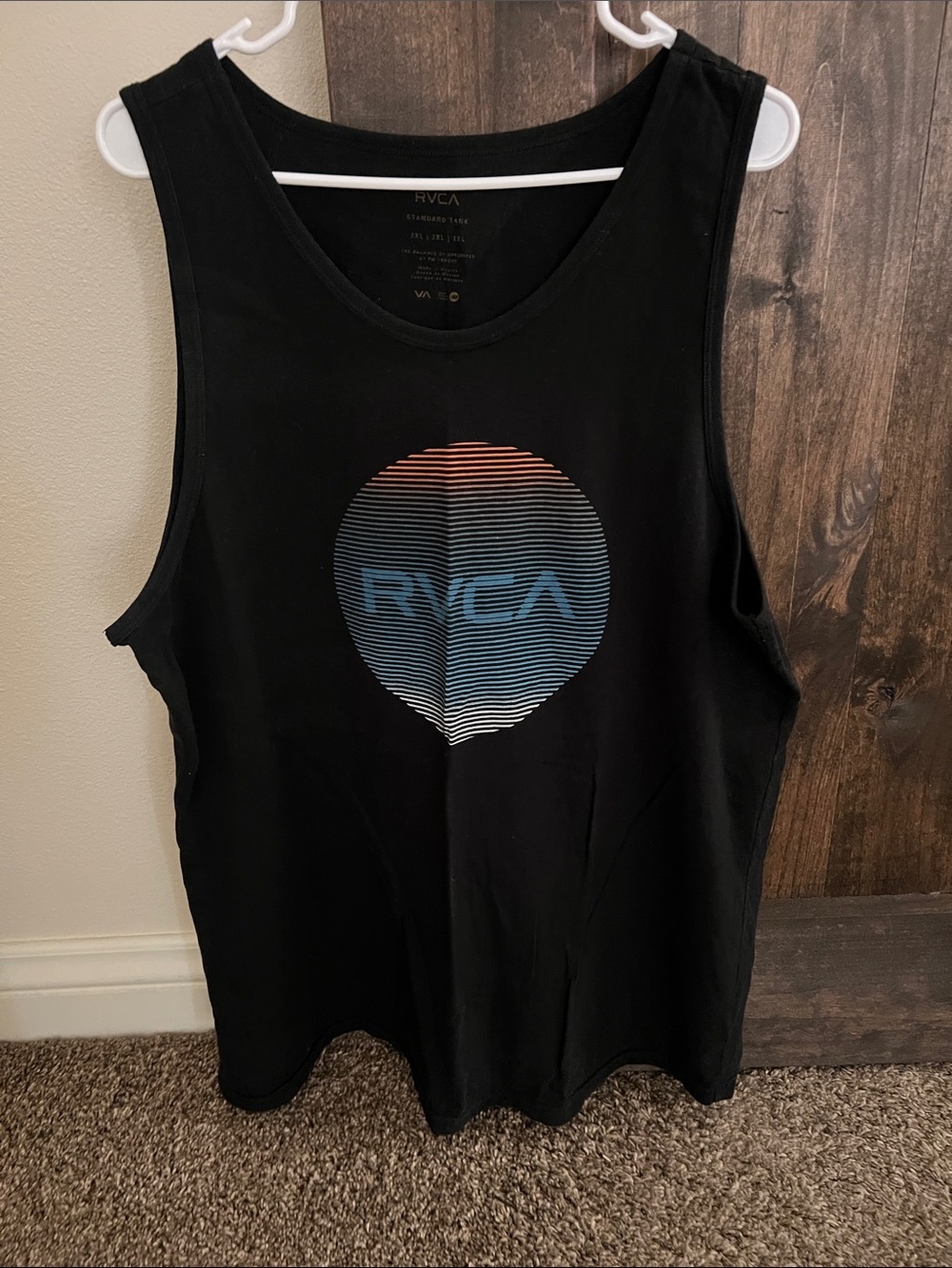RVCA Black Tank with Blue-to-Orange Gradient Circle Logo